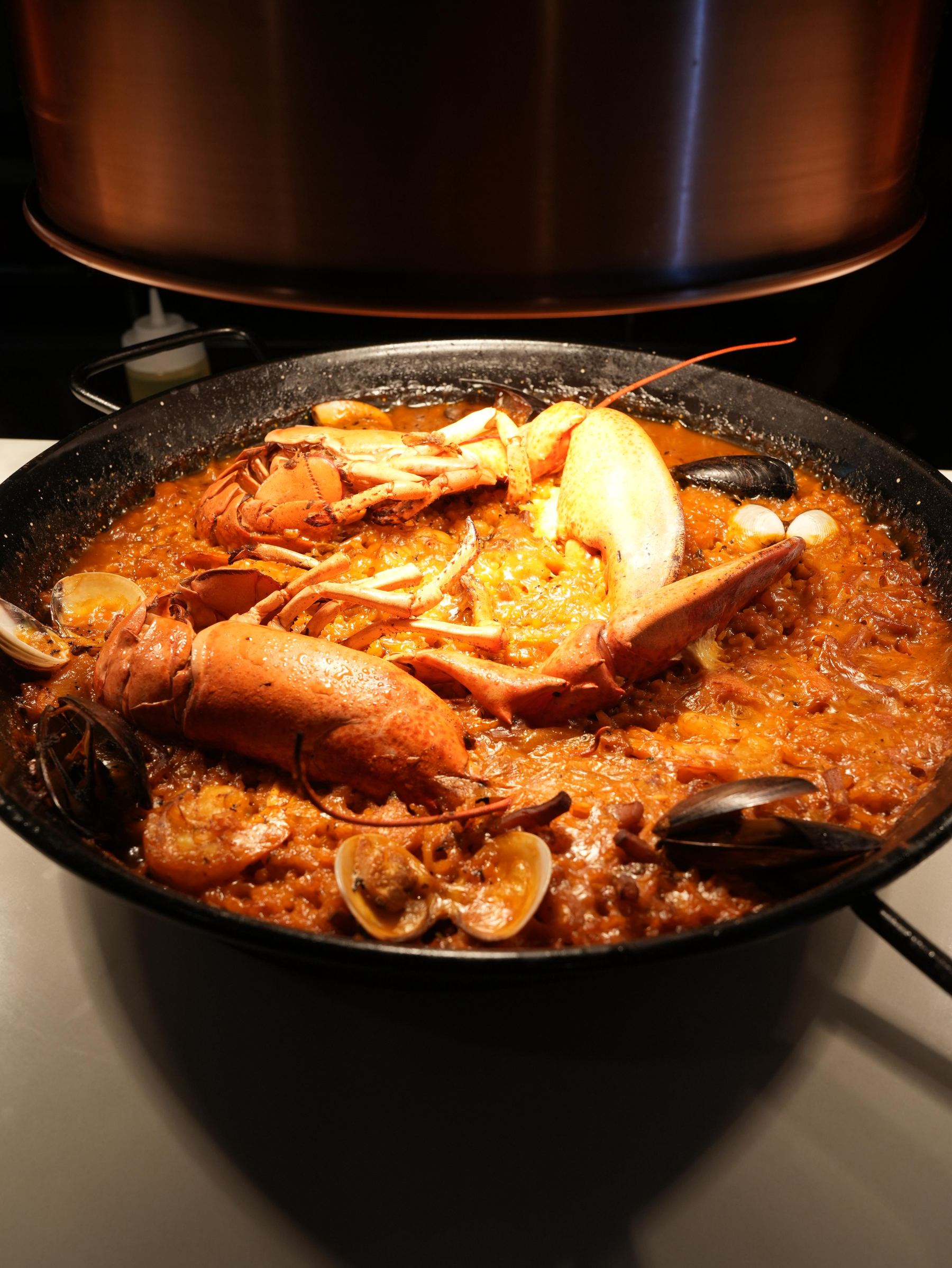 Seafood paella with lobster, mussels and clams at Madrid Tapas y Vinos